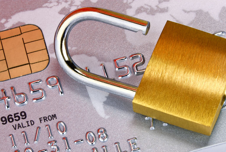 Padlock on top of a credit card