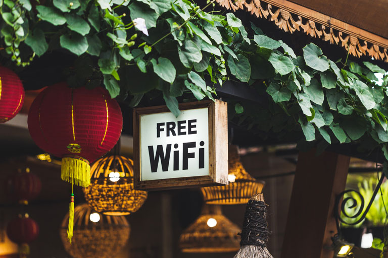 "Free wifi" sign hanging at a chinese restaurant
