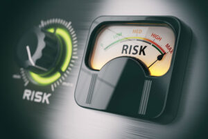 Risk needle pointing at the maximum risk setting