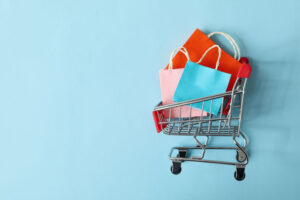 Shopping cart full with shopping bags