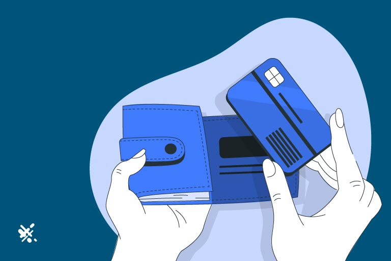 Woman taking a credit card out of a wallet