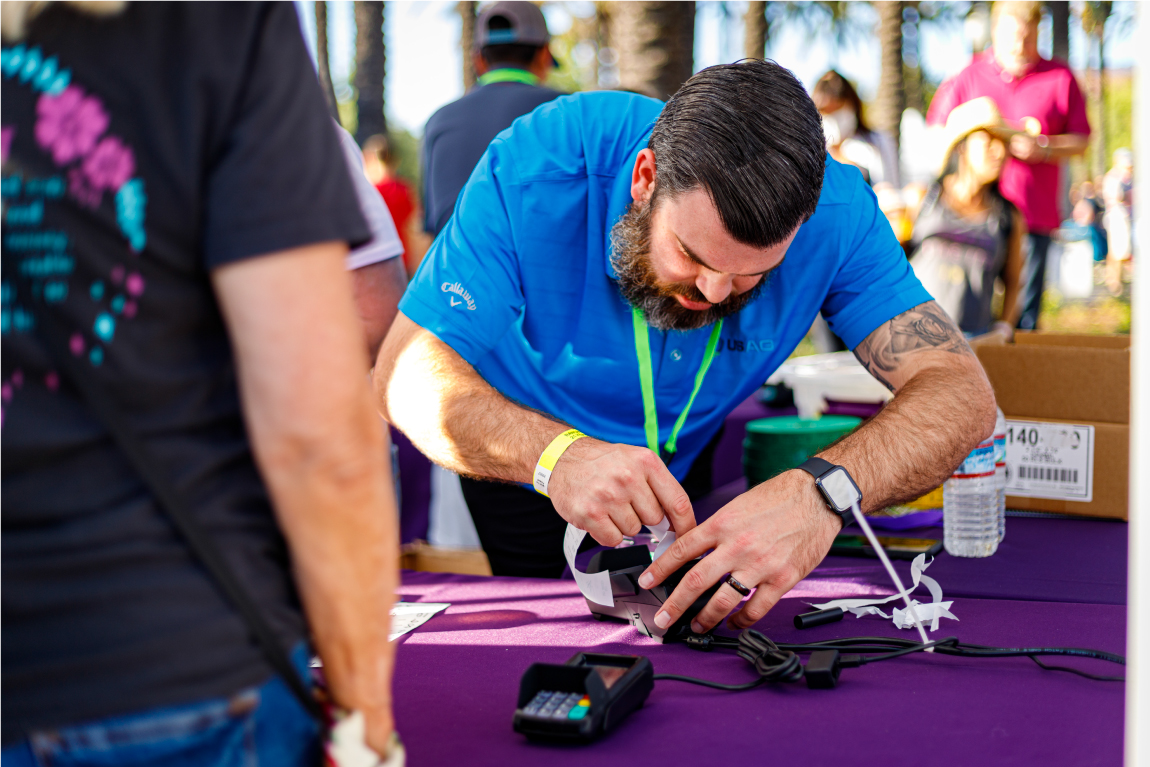 Team member ripping a receipt in a terminal demonstration