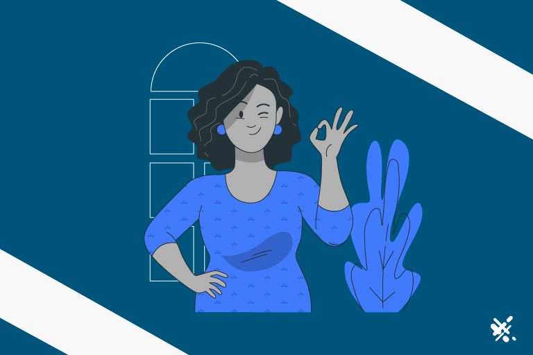 Woman wearing a blue sweater making an ok sign with her hand
