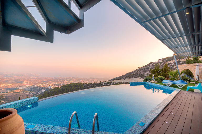 View from a house in the hills with a backyard pool