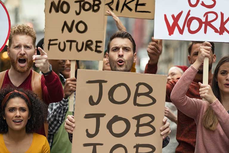 Unemployed people protesting and shouting while holding up signs