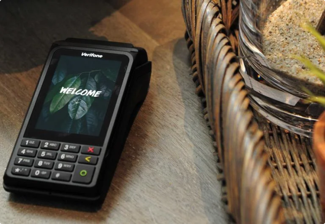 A Verifone terminal on a countertop