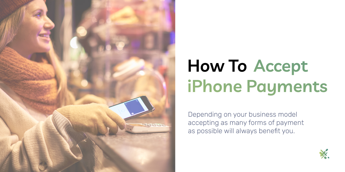 Woman paying for food with her iphone on a contactless payment terminal