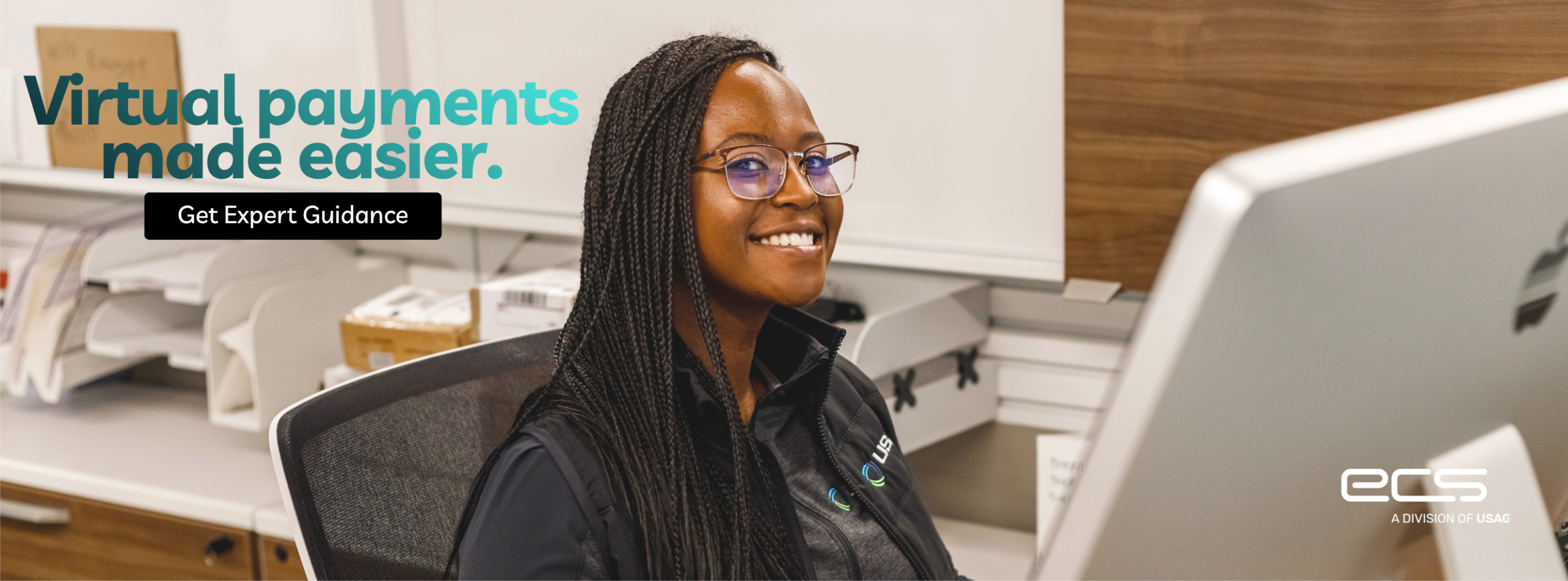 Virtual payments made easier with expert guidance from a business payment processing representative at a modern office workstation.